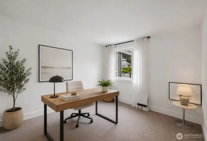 3rd bedroom virtually staged as an office. 3rd bedroom virtually staged as an office.