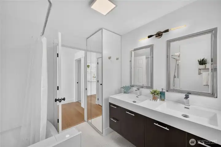 Main bathroom with double vanity, tub and shower. Main bathroom with double vanity, tub and shower.