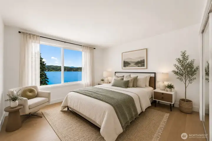 Virtually staged primary bedroom with w/d unit and half bath. Virtually staged primary bedroom with w/d unit and half bath.