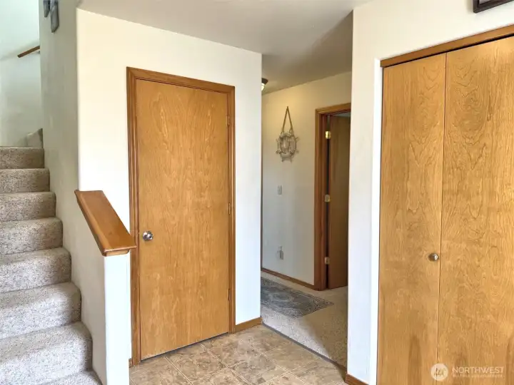 Main entry with storage and coat closet.