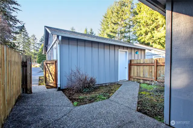 Backside of garage opens into private courtyard.