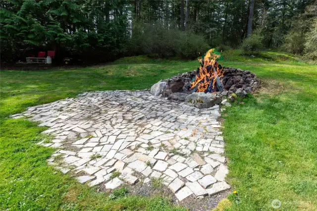 Enjoy days or evenings near the grotto style fire pit.