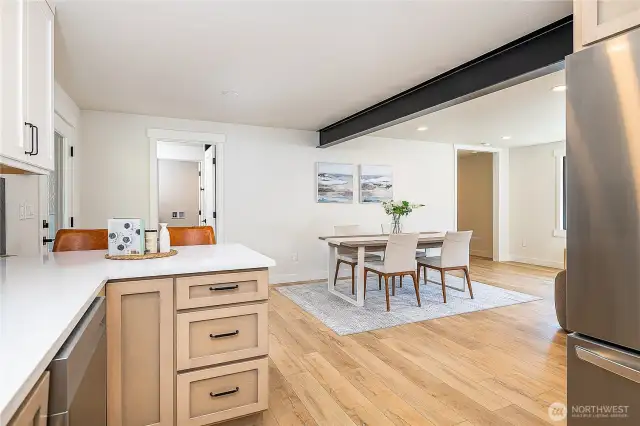 The floor plan offers a great flow, connecting the kitchen eating area effortlessly to the full bath and dining space for easy living and entertaining