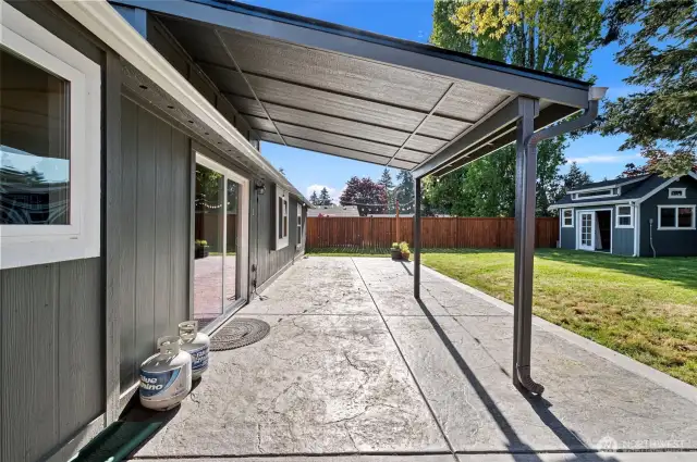 Backyard ready for your outdoor activities - covered patio is a plus!