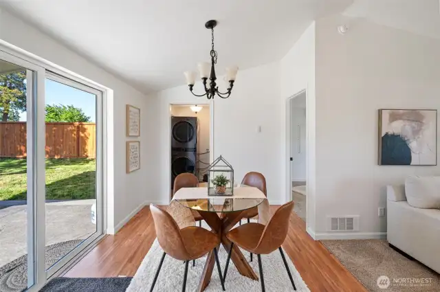 Well sized dining area - oversized slider connects inside to out.