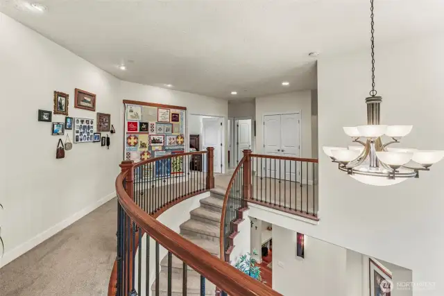 Upstairs with the drop down electric light over the foyer
