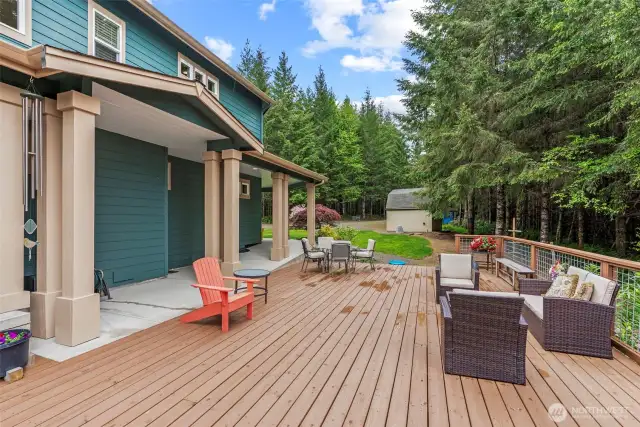 Beautiful Entertainers Deck viewing down the driveway and pump house with extra storage