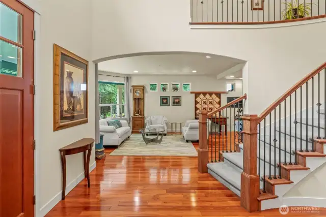 Did you notice the eucalyptus floors. throughout the home imported from Chile and they look just as stunning in person as they do in the pictures. Foyer to living room