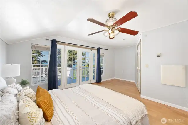 The primary bedroom also opens out onto the upper deck