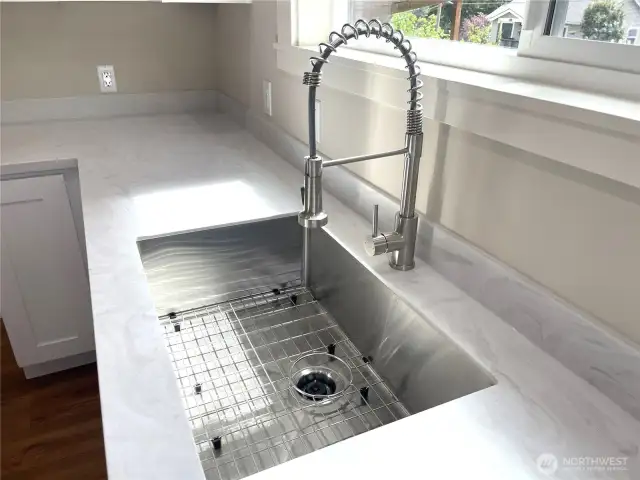 I love this stainless steel undermount sink, with the drying rack accessory. Wash, rinse and dry all in one place.