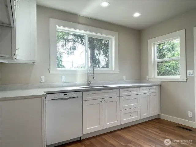 All of the lighting has been updated to LED to save on your energy bill!  New recessed lighting and two nice windows allow for so much light to come into the kitchen. The windows have been carefully trimmed out to match the older feel of the home.