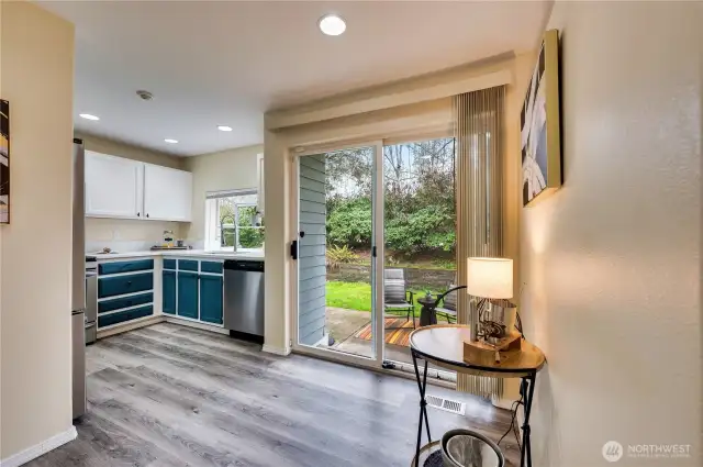 Eating space adjacent to kitchen, opens onto patio