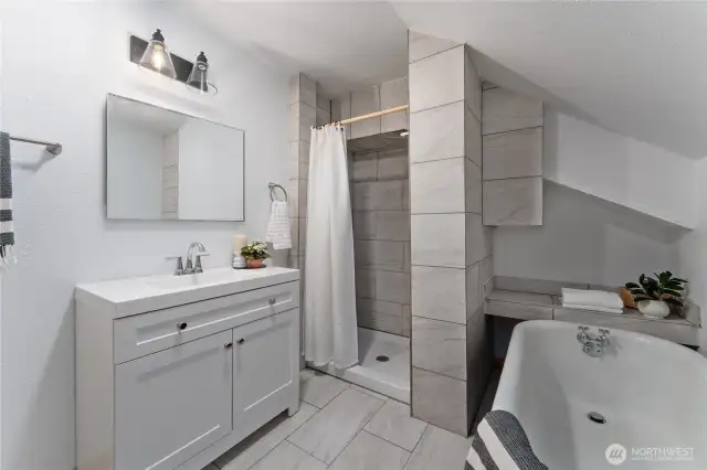 Upstairs bathroom with claw foot tun and rain shower!