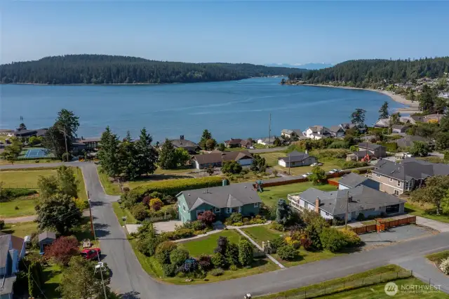 Deeded access to the beach located at the end of Washington Street is included.