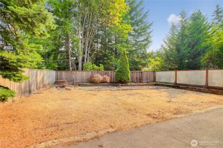 Left Side of Driveway has plenty of room for additional parking, RV, boats, and all your toys.