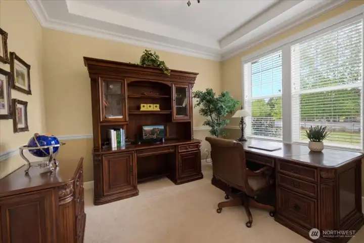 First floor den situated to see all of the comings and goings around you.