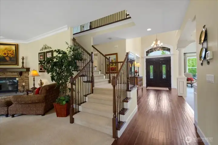 Sweeping staircase with metal details