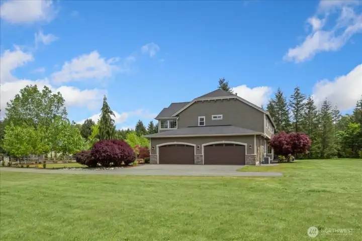 Home is an "end loader" garage which provides nice wide presence and WOW curb appeal