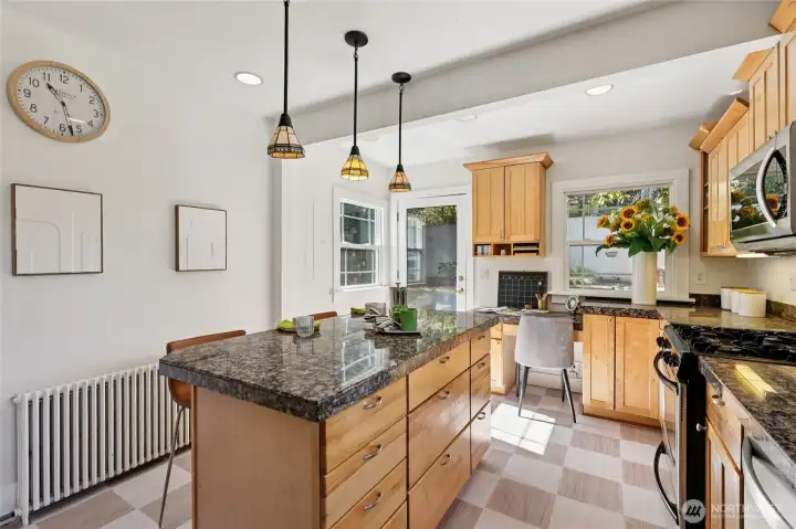 Natural light pours into this kitchen always keeping it bright and cheery