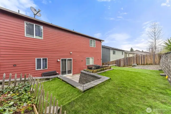 Tiered backyard for great drainage and maximizing all areas!