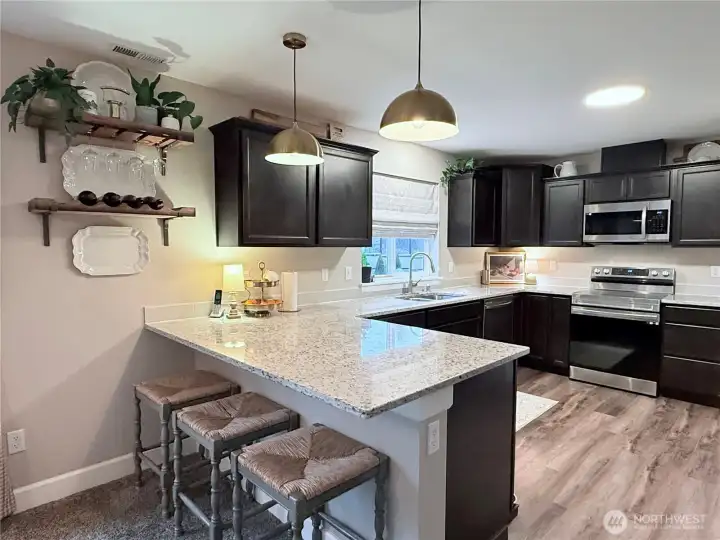 Inviting kitchen with granite countertops