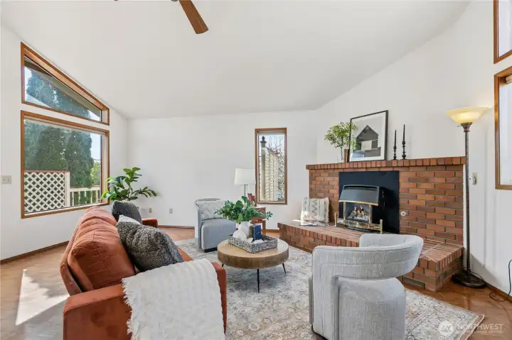 Vaulted ceilings and abundant natural light in the airy living room.