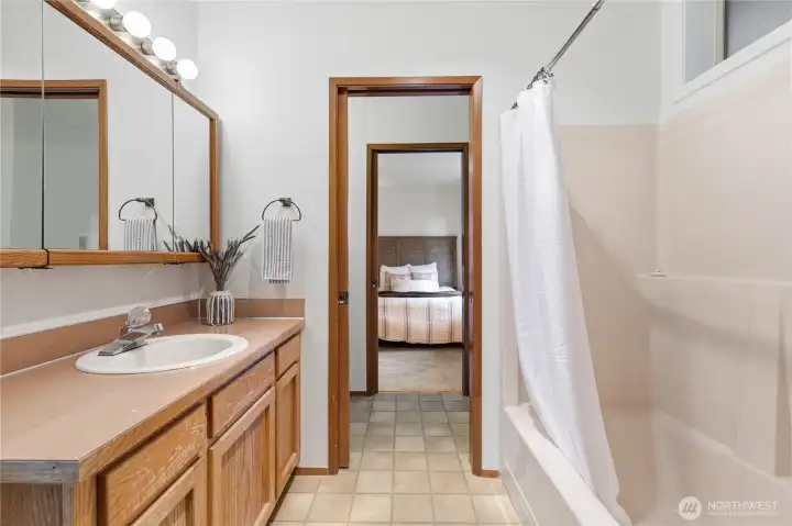 Jack and Jill bathroom is a full bath AND a half bath and connects the two bedrooms for efficient privacy.
