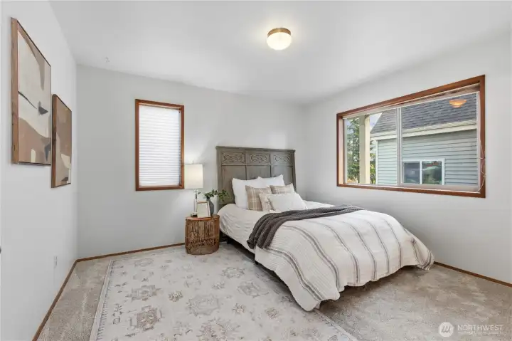 2nd Bedroom with new carpet, fresh paint and neutral finishes.