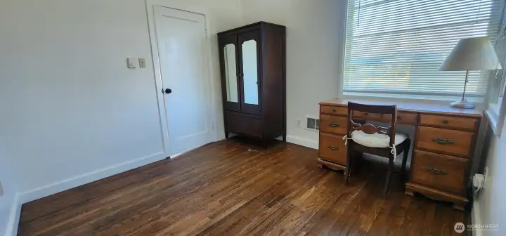 Bedroom 2 with antique armoire to convey with sale