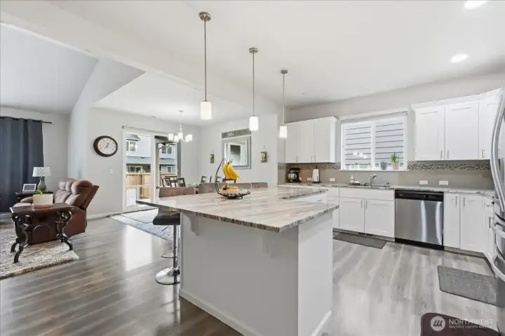 Great room features Gourmet Kitchen open to dining area and family room