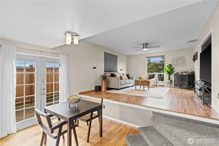 eating nook off of kitchen and french doors that lead out to deck.