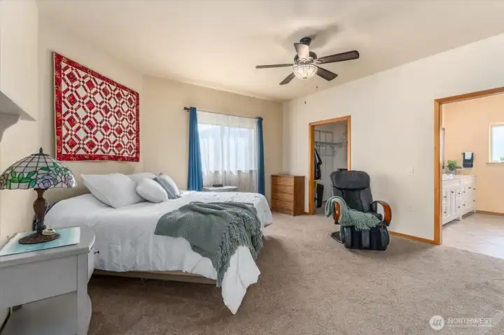 Primary has 3/4 bath, walk-in closet, and slider to private back patio.