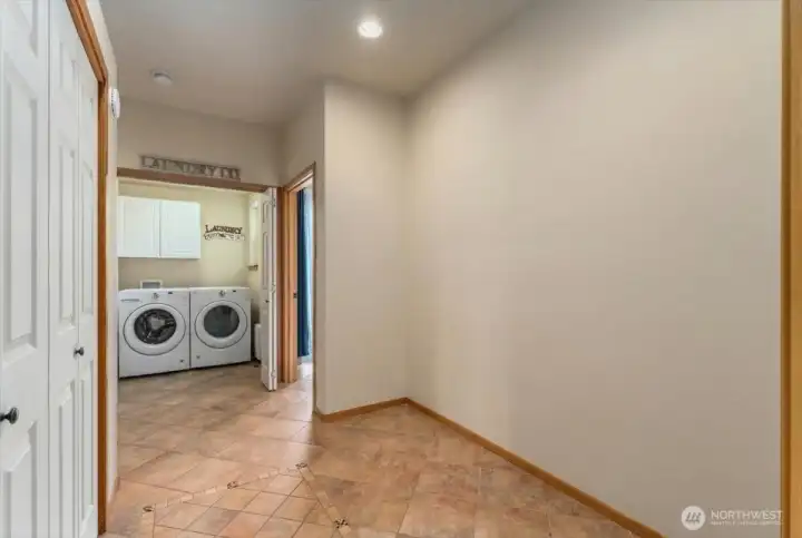 Laundry on main outside primary bedroom