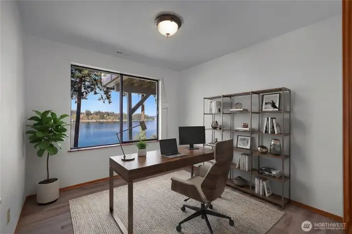 BR 2 - Flexible bedroom, office or den enjoys natural light and a beautiful waterfront outlook.