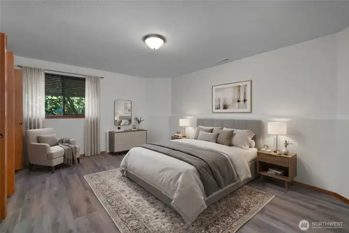 BR 4 - Oversized lower-level bedroom with room to relax and unwind.