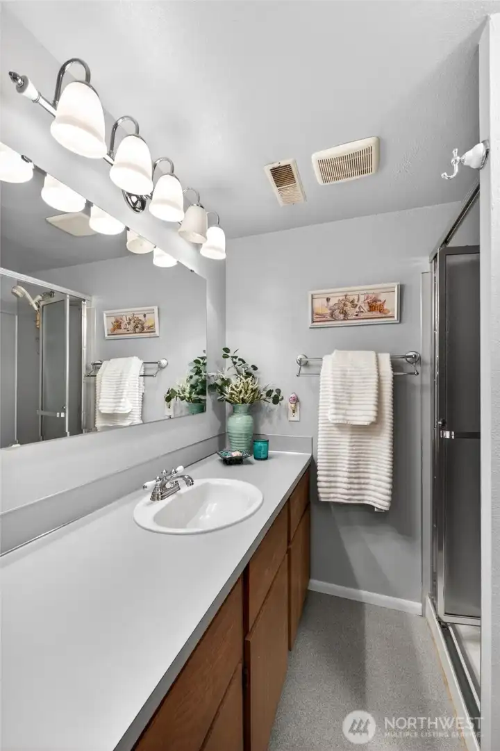 with a 3/4 bath just across the hallway.