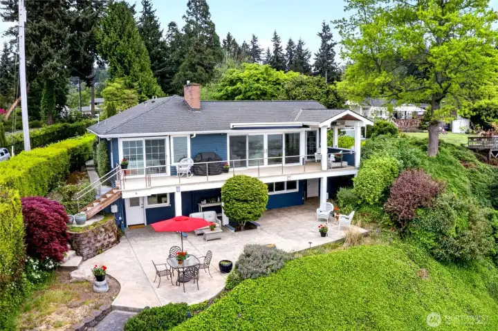 The entertainment size rear patio offers a front row seat to the ever changing seascape.