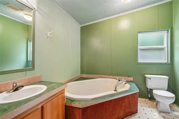 Soaking tub in bathroom