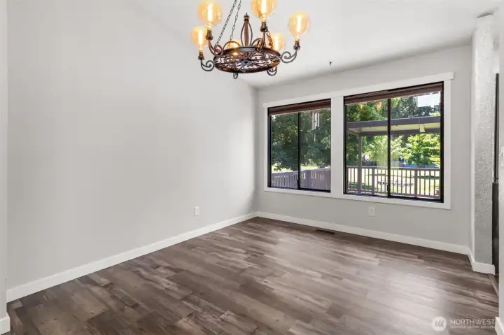 Spacious formal dining room adjacent to kitchen