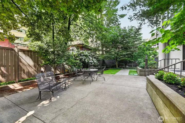 Exterior community patio on main level.