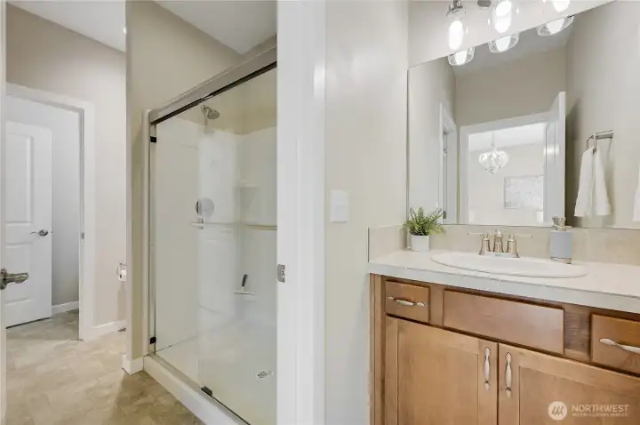3rd Suite Bathroom with Two Vanities and 2 Toilets.