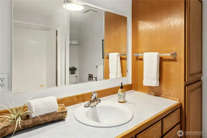 En suite bathroom accessible from the owner's suite and the laundry room. En suite bathroom accessible from the owner's suite and the laundry room.