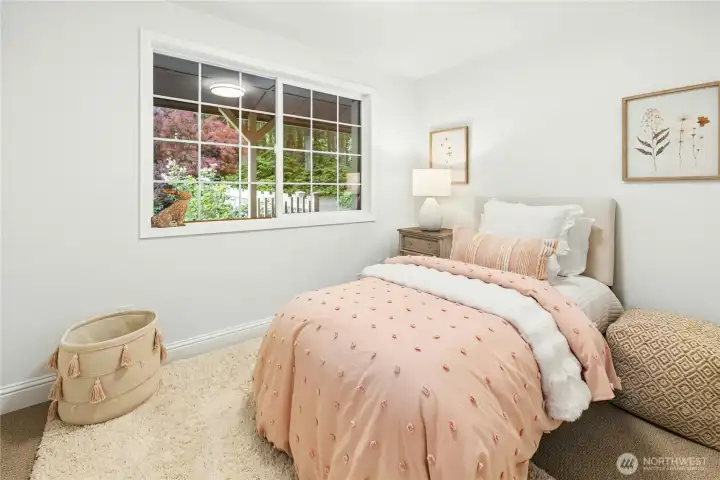 The first of two additional bedrooms, both west facing. The first of two additional bedrooms, both west facing.