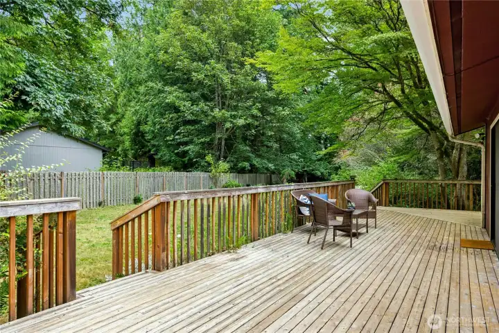 The large wrap-around deck is perfect for relaxing and BBQs. The large wrap-around deck is perfect for relaxing and BBQs.