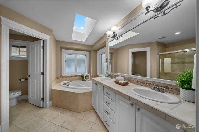 Indulge in luxury with a five-piece primary bathroom, offering a serene retreat with its spa-like amenities.