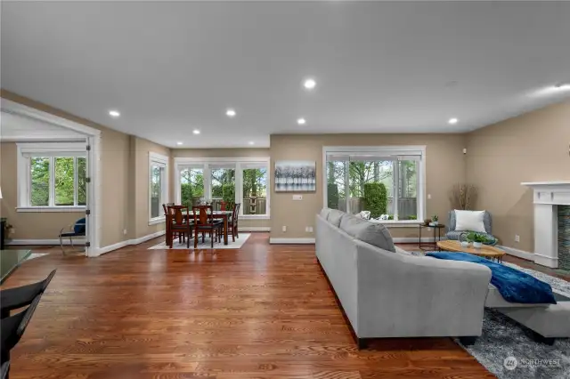 Experience the comfort of a spacious family area with an open floor concept, ideal for relaxation and entertainment. The beautifully refinished hardwood flooring adds warmth and elegance to this inviting space.