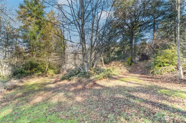 Numerous trails and former gardens exist throughout this beautiful property. Make this special property your place to call home!