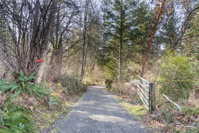 Enter your five-acre parcel at the gated, private, quiet end of Bobcat Lane. Hundreds of acres of private forest land surround this short plat.
