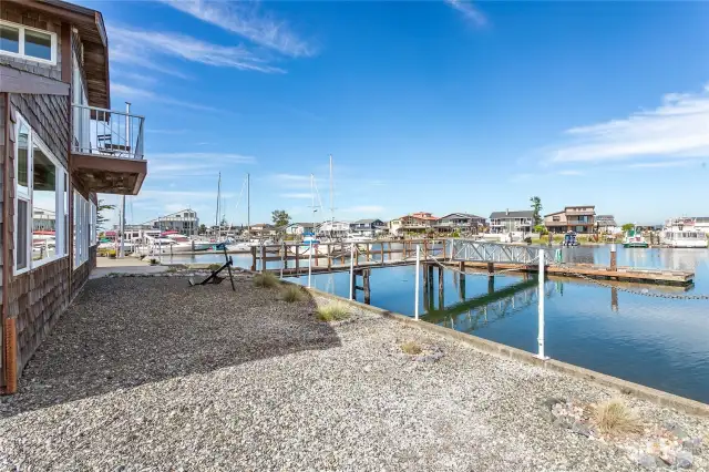 View of the front dock from the bulkhead. There is low maintenance landscaping throughout the property, perfect for a second home