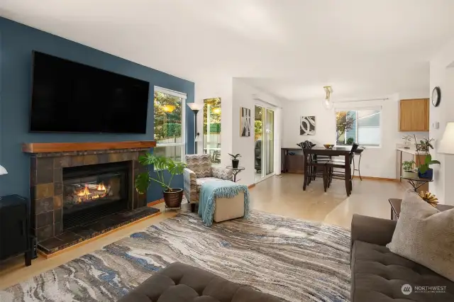 Living Room and Dining Room with Open Floor Plan, and Slate Tiled Wood Fireplace